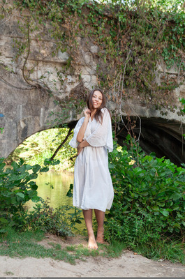 Sumiko Slips A White Robe Off Under The Stone Arch - 03