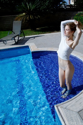 Alice May Wades Out Of The Pool And Spreads Across A Red Velvet Lounger - 00