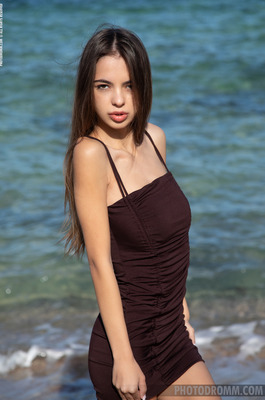 Luana Walks The Shoreline And Lies Back Naked On Wet Sand - 00