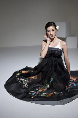 Eunkyung Oh Slips Out Of A Black Butterfly Gown In A White Studio - 00