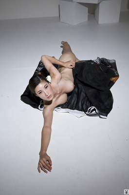 Eunkyung Oh Slips Out Of A Black Butterfly Gown In A White Studio - 08
